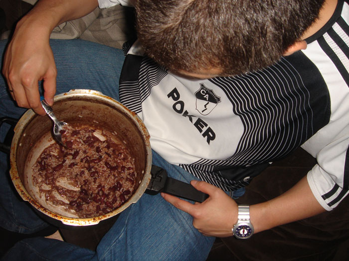 Alex Nino eating beans in a terrible hangover